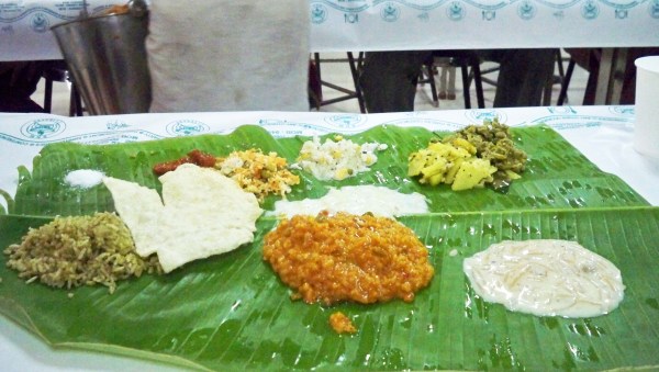 South-Indian wedding food served on a banana leaf