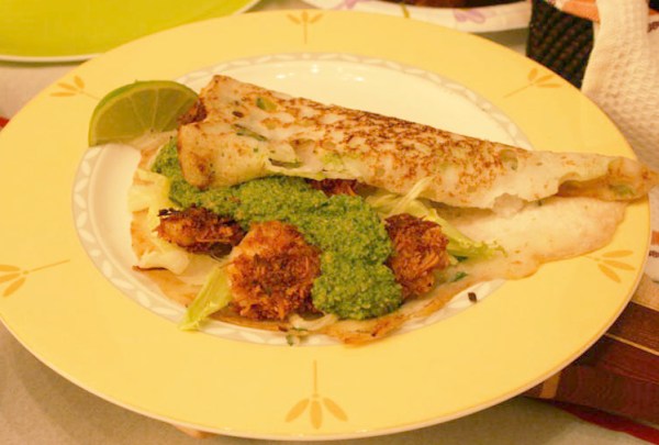 Coconut encrusted shrimp in a rice crepe